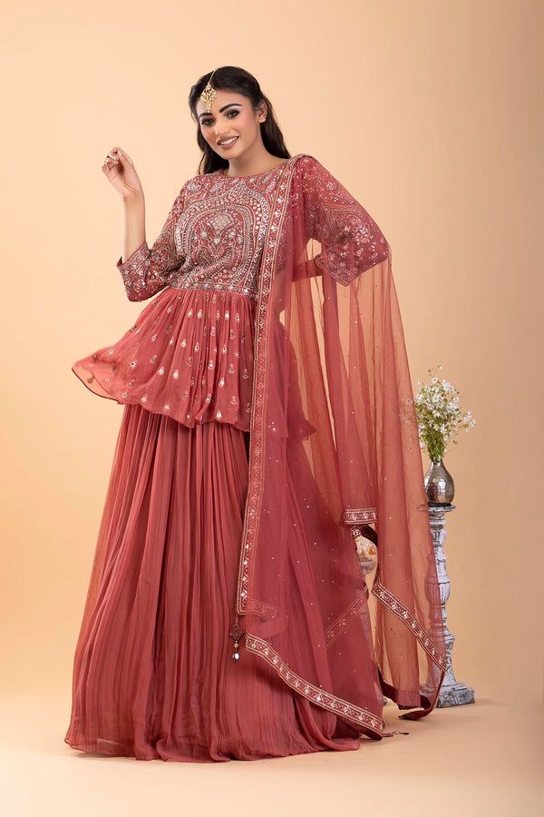 Rust Georgegette Lehenga set with peplum top